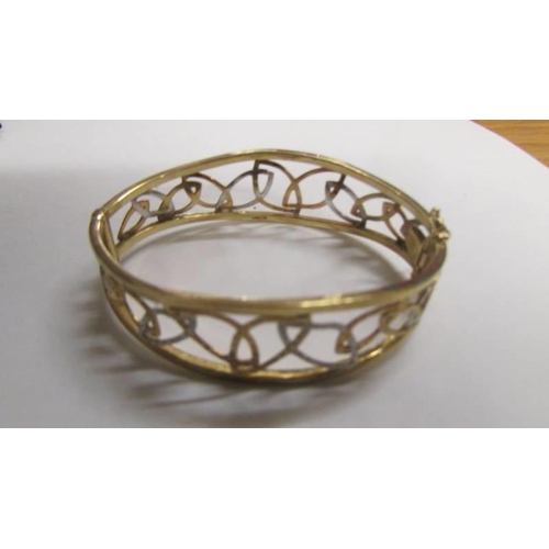 10 - A 9ct gold bangle, 10.9 grams.