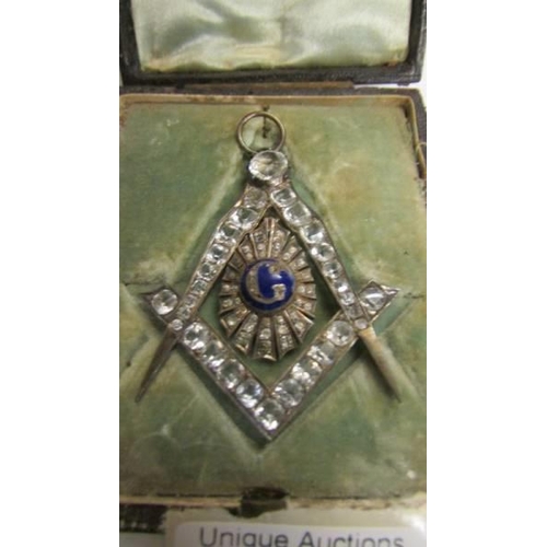 13 - A Masonic jewelled pendant.