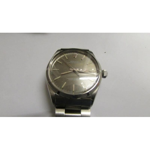 18 - A Rolex Oyster perpetual - 1003, stainless steel case, No. 2153452. Grey dial 34mm diameter, working... 