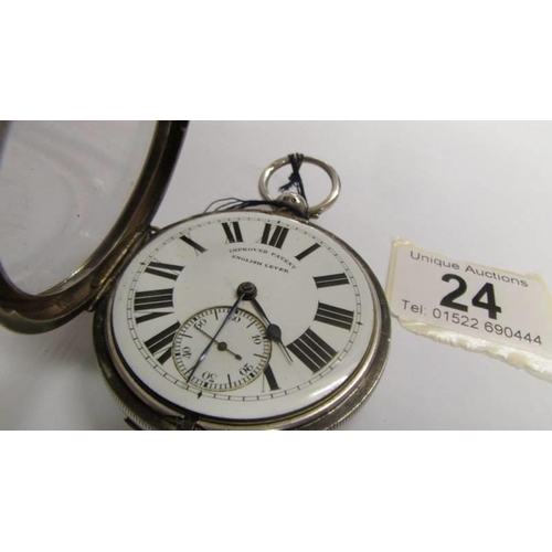 24 - A Chester silver English lever pocket watch with key, circa 1900, 58mm diameter in working order.