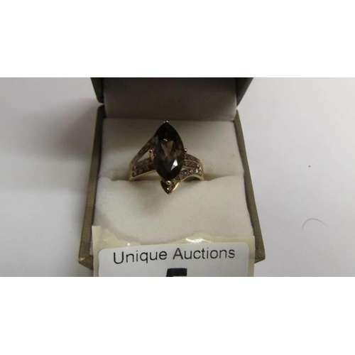 5 - A 9ct gold ring set amethyst coloured stone, size S, 4 grams.