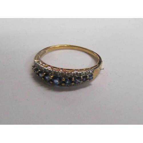 6 - A 9ct gold half eternity ring, size S half, 2.2 grams.