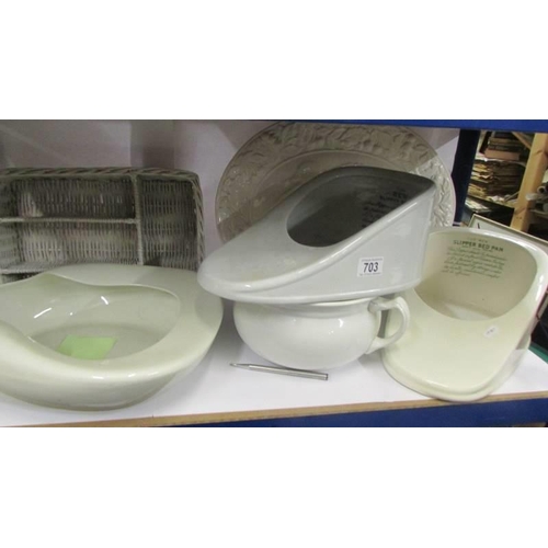 703 - Three ceramic bed pans, a chamber pot, meat platter etc.,