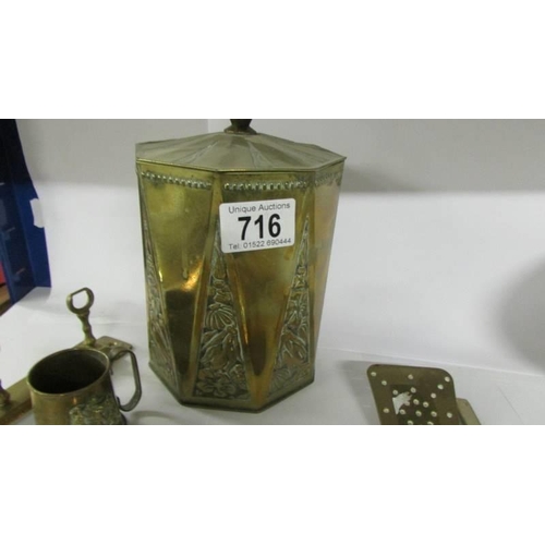 716 - A mixed lot of brass ware including tea caddy.