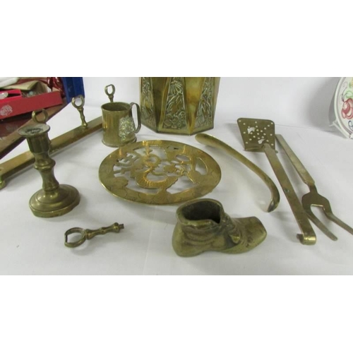 716 - A mixed lot of brass ware including tea caddy.