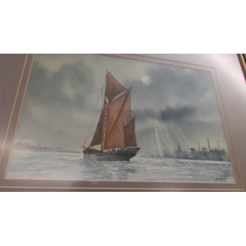 726 - A framed and glazed watercolour seascape signed J Coldron.