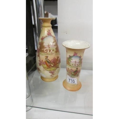 730 - Two vases decorated with pheasants, (1 a/f, hairline crack to neck).