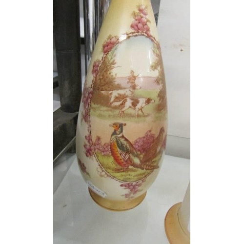 730 - Two vases decorated with pheasants, (1 a/f, hairline crack to neck).