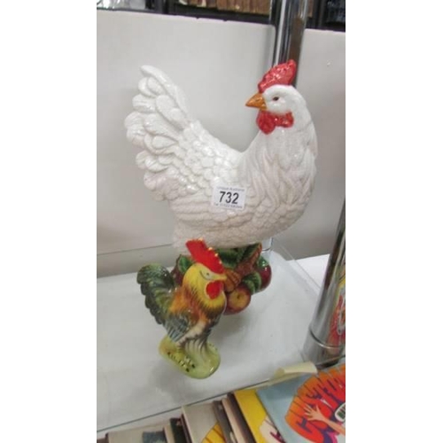 732 - A large ceramic hen and a small cockerel.