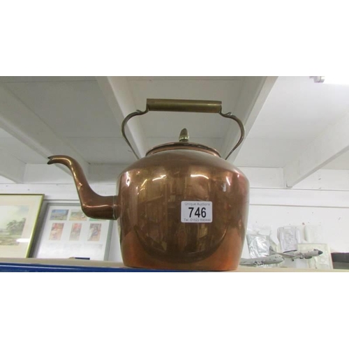 746 - A large copper kettle.