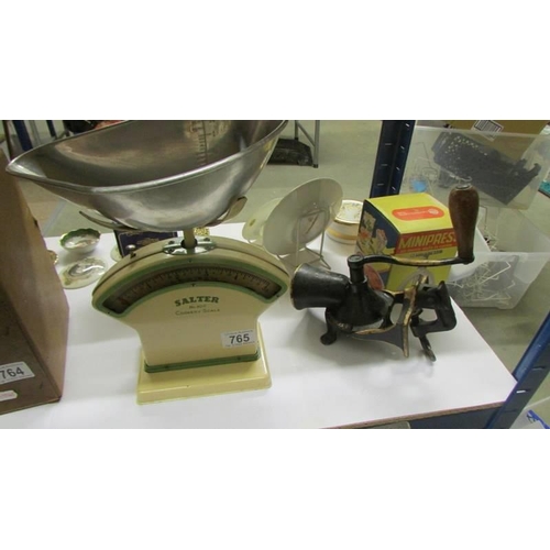 765 - A set of salter scales and a mincer etc.,