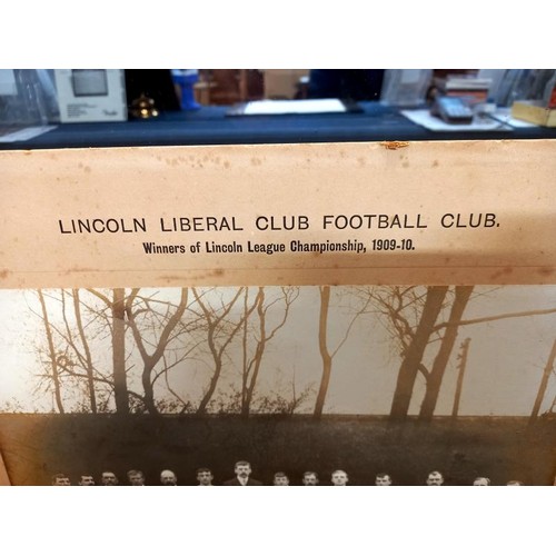 785 - A Lincoln Liberal Club football club, 1909/10 team photograph on card, winners of Lincoln league cha... 