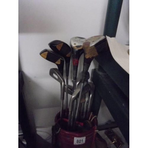 801 - A vintage golf bag with clubs, COLLECT ONLY.