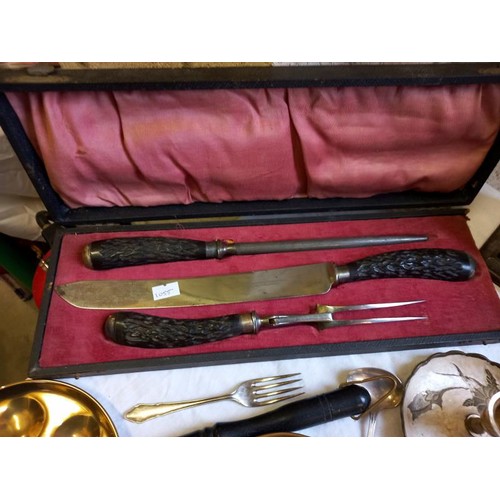 887 - A cased carving set, brass pans, chamber candlesticks & EPNS brush & mirror set etc.