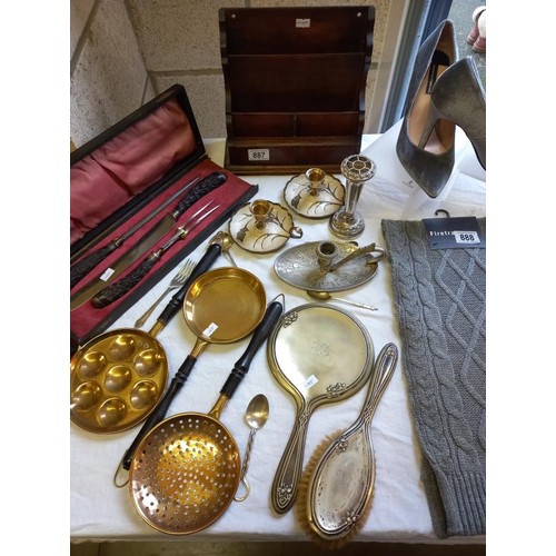 887 - A cased carving set, brass pans, chamber candlesticks & EPNS brush & mirror set etc.