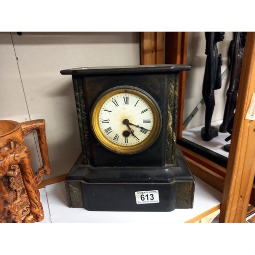 613 - A 19th century black slate Paladian style clock in working order. COLLECT ONLY.