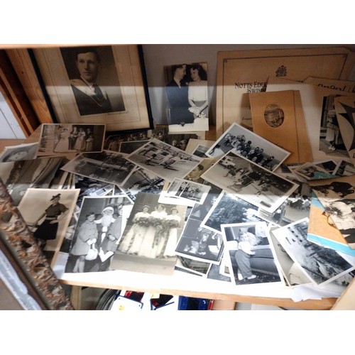 632 - A large lot of black and white photographs, 35mm slides etc.,