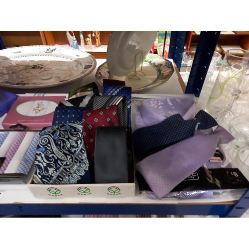 717 - A good lot of neck ties, new handkerchiefs, a new shirt (collar 14.5) and ladies scarves.