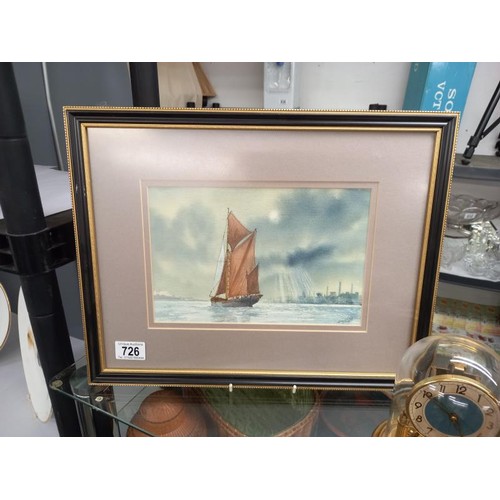 726 - A framed and glazed watercolour seascape signed J Coldron.