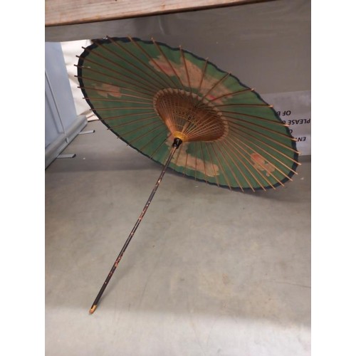 743 - A hand painted parasol.