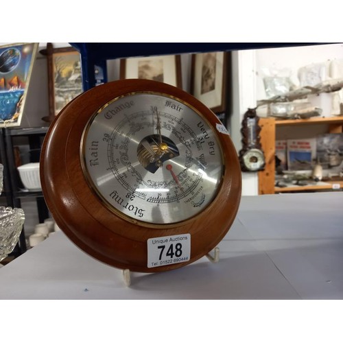 748 - An aneroid barometer.