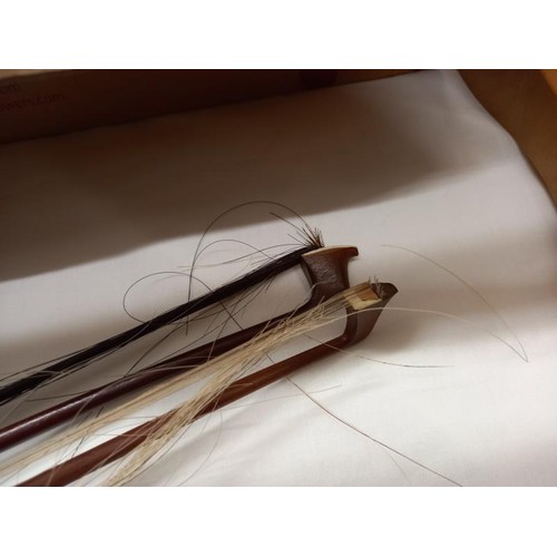 816 - Two antique violin bows, 1 x 26 7/8 inches, 1 x 28 7/8 inches, no visible makers marks.