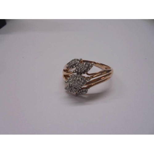 31 - A yellow gold and diamond shaped ring, size O half, 2.9 grams.