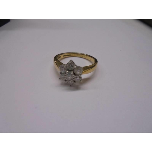 33 - An 18ct yellow gold floral diamond ring, size M, 4.4 grams.