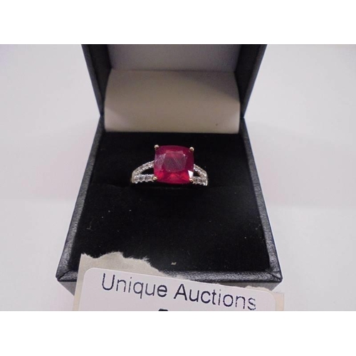 45 - A yellow gold diamond and ruby ring, size N, 2.9 grams.