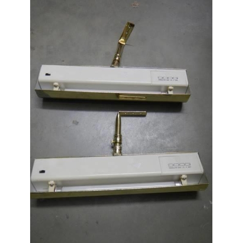 500 - Two brass picture lights.