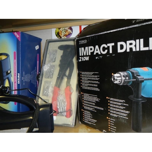 518 - A riveting gun, Impact drill and other tools.