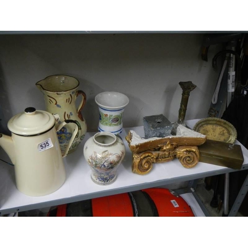 535 - A tray of interesting items including jugs etc.,