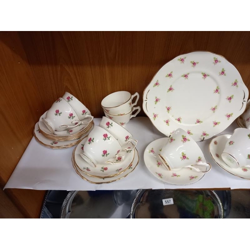 563 - A mixed lot of tea sets of same/similar designs (2 shelves)