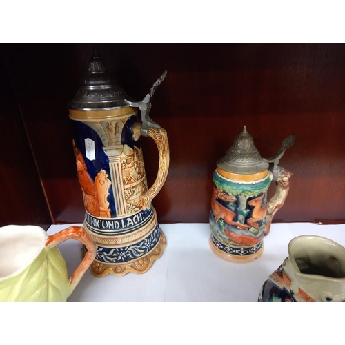 566 - 2 German beer steins & 3 other jugs