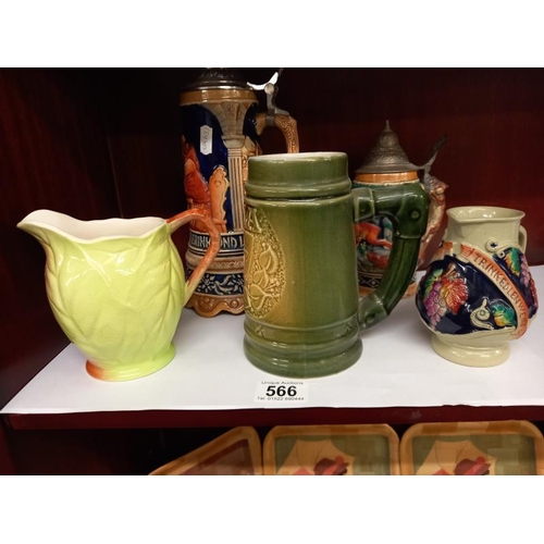 566 - 2 German beer steins & 3 other jugs