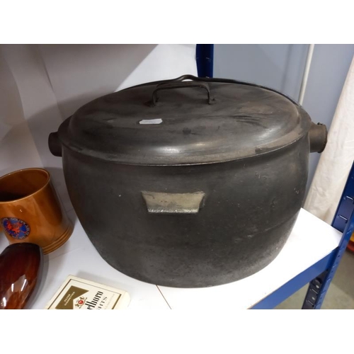 596 - A lidded cast iron cauldron & ceramic barrel etc.