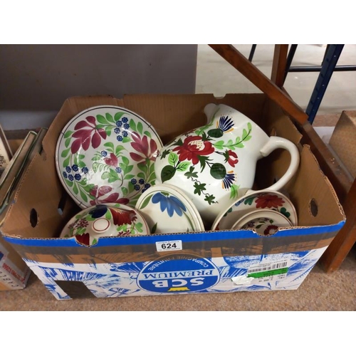 624 - A floral pottery jug & other items including plates