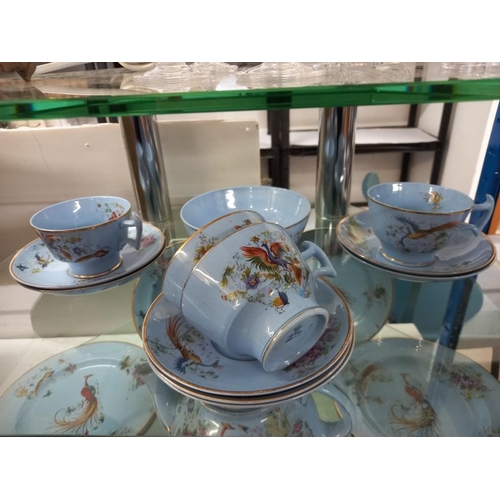 627 - A blue patterned tea set with pheasant design