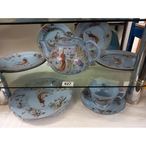 627 - A blue patterned tea set with pheasant design