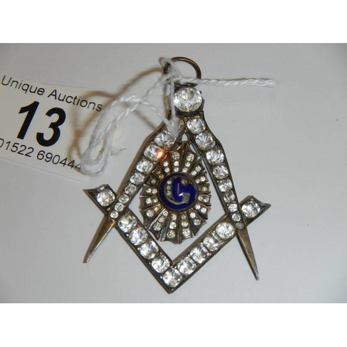 13 - A Masonic jewelled pendant.