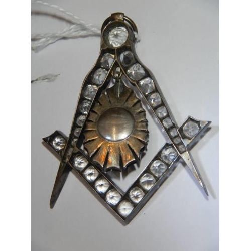 13 - A Masonic jewelled pendant.