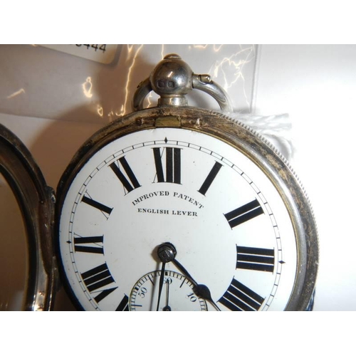 24 - A Chester silver English lever pocket watch with key, circa 1900, 58mm diameter in working order.