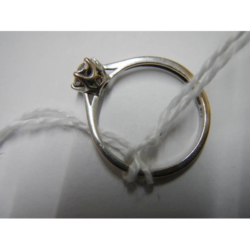 29 - A white gold floral diamond ring, size N half, 1.9 grams.