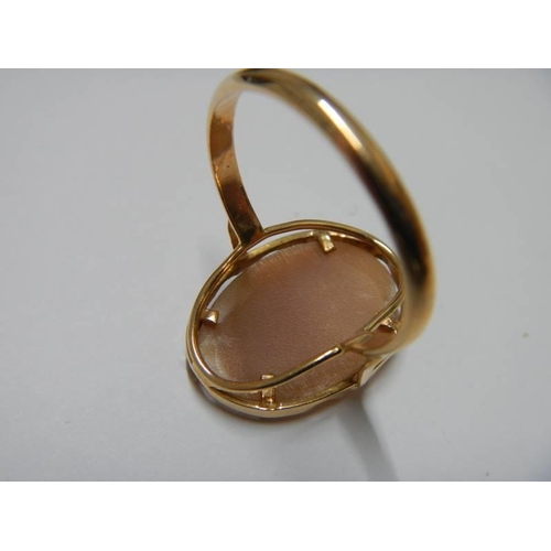 3 - A 14kt gold ring set rose cut cameo, size R half, 3.6 grams.