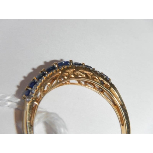 6 - A 9ct gold half eternity ring, size S half, 2.2 grams.