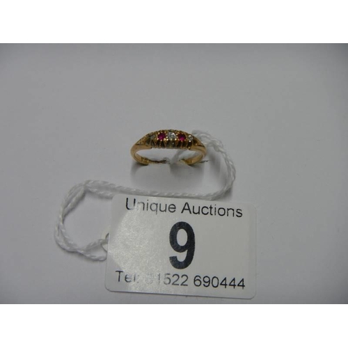 9 - An 18ct gold diamond and ruby ring, size N, 2.7 grams.