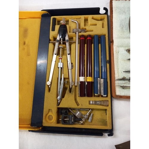 643 - A good lot of drawing instruments, compasses etc.,