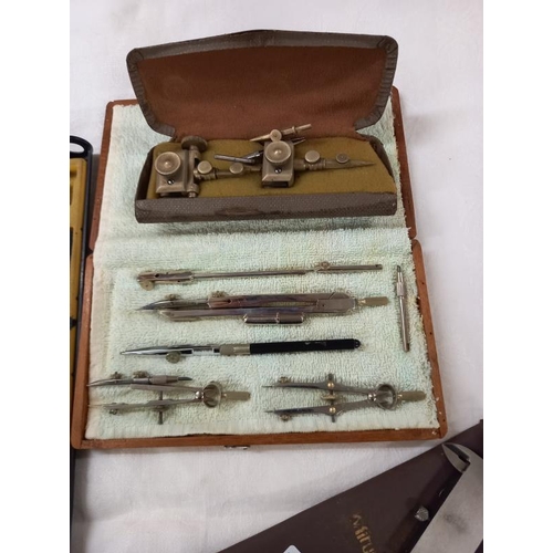 643 - A good lot of drawing instruments, compasses etc.,