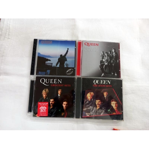 660 - Six Queen CD's, three The Beatle's CD's and two Manic Street Preachers CD's.