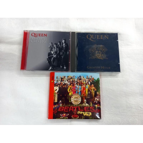 660 - Six Queen CD's, three The Beatle's CD's and two Manic Street Preachers CD's.